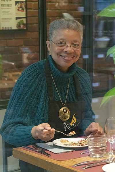 Monique eating black-eyed pea salad